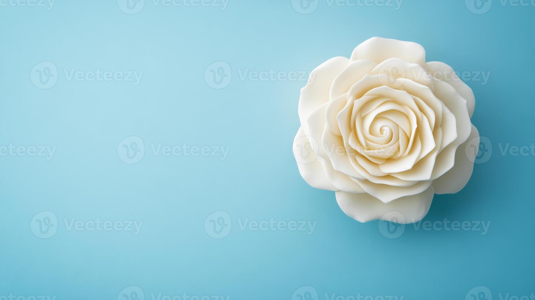Butter sculpture of a delicate blooming rose with petals layered in a spiral isolated on a pastel blue gradient background soft shadows creamy texture photo