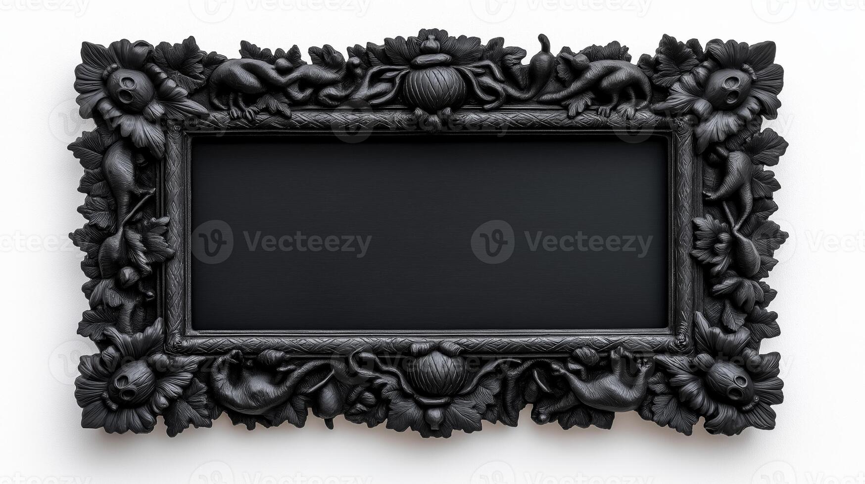 Top down shot of a rectangular Halloween style frame with intricate carvings of witches cauldrons and black cats in a dark vintage finish isolated on a white background photo