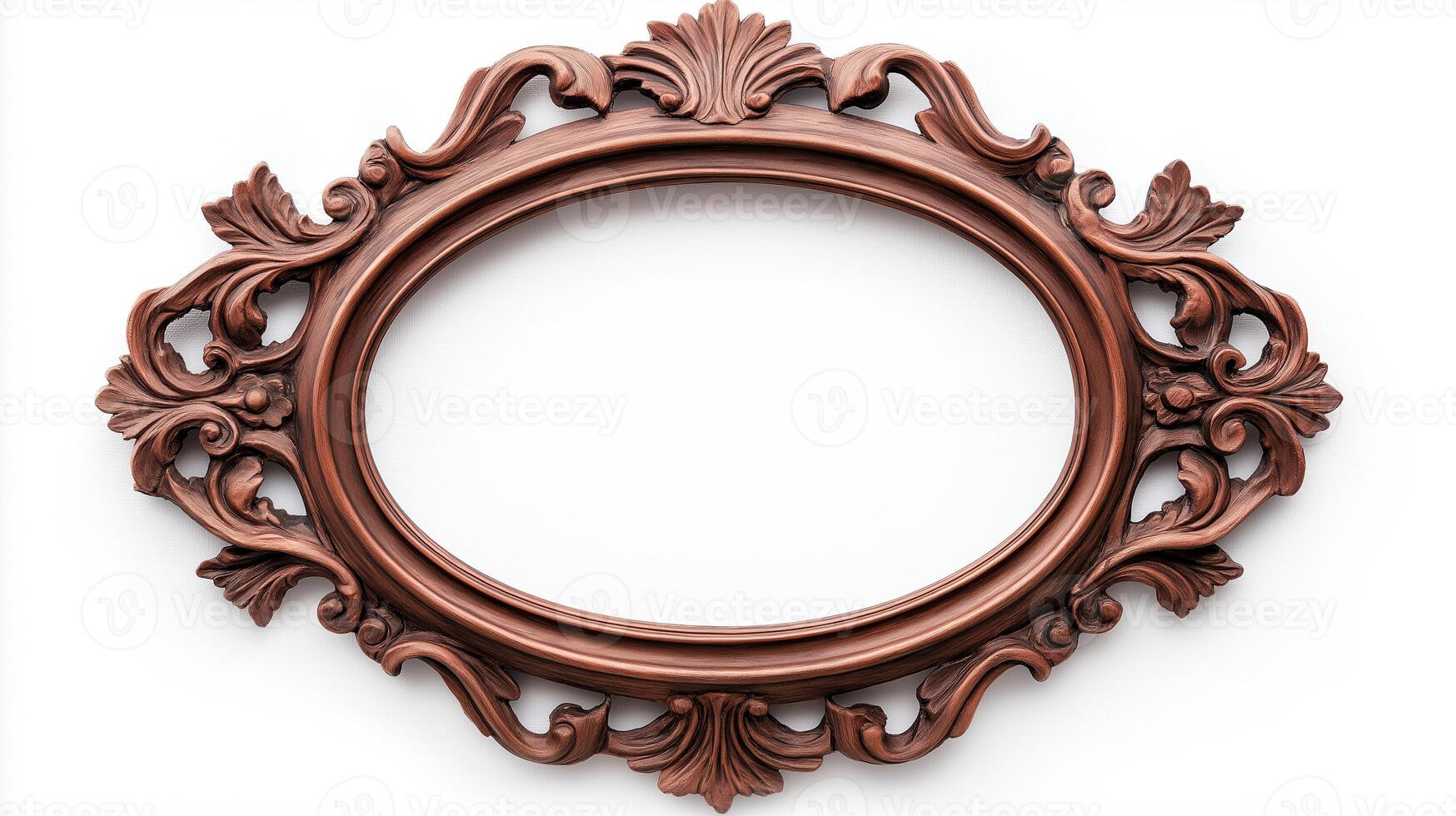 Wide angle shot of a vintage oval shaped picture frame with elaborate carvings and patina featuring baroque style scrolls and leaves isolated on a pure white background photo