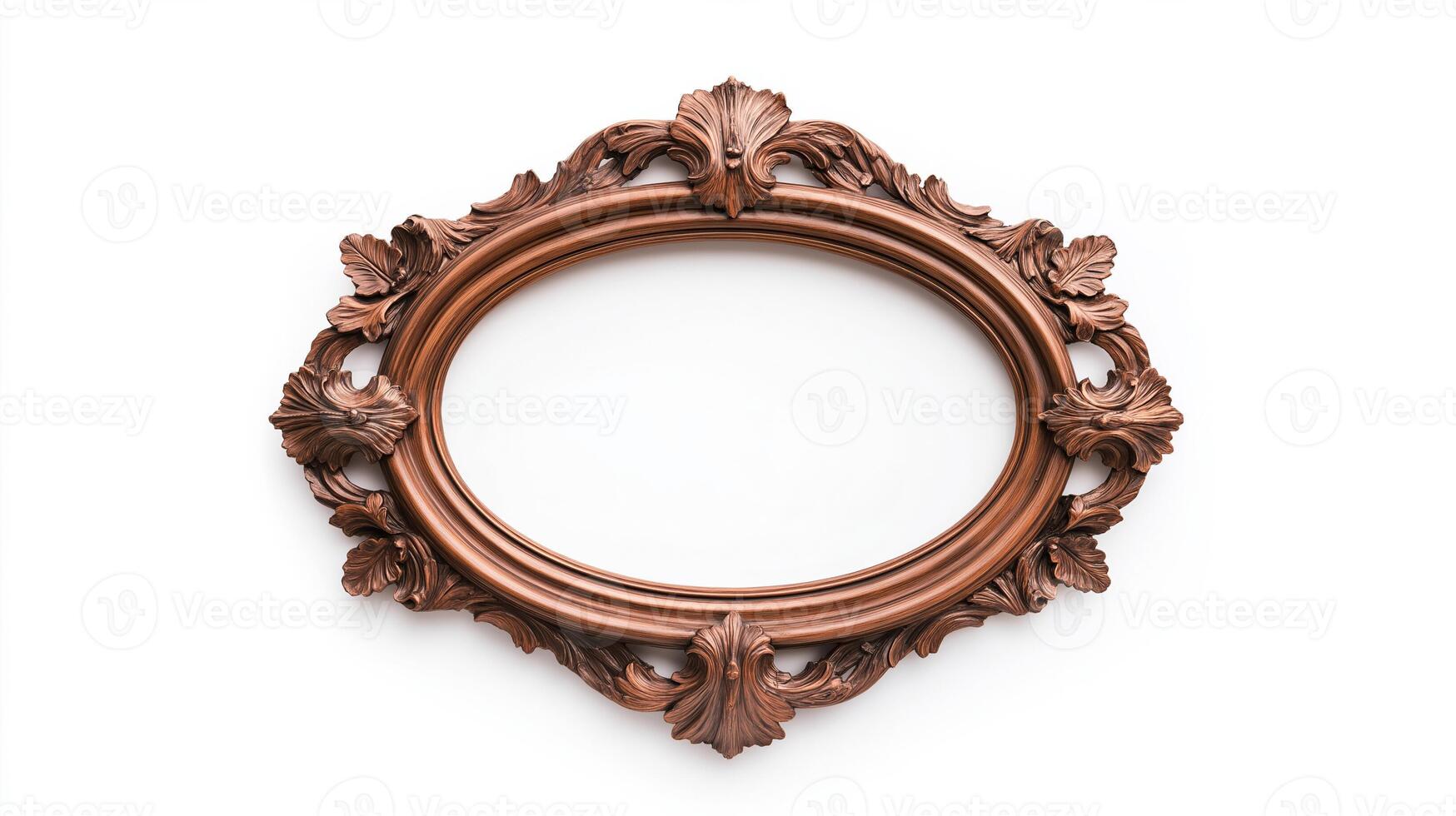 Wide angle shot of a vintage oval shaped picture frame with elaborate carvings and patina featuring baroque style scrolls and leaves isolated on a pure white background photo