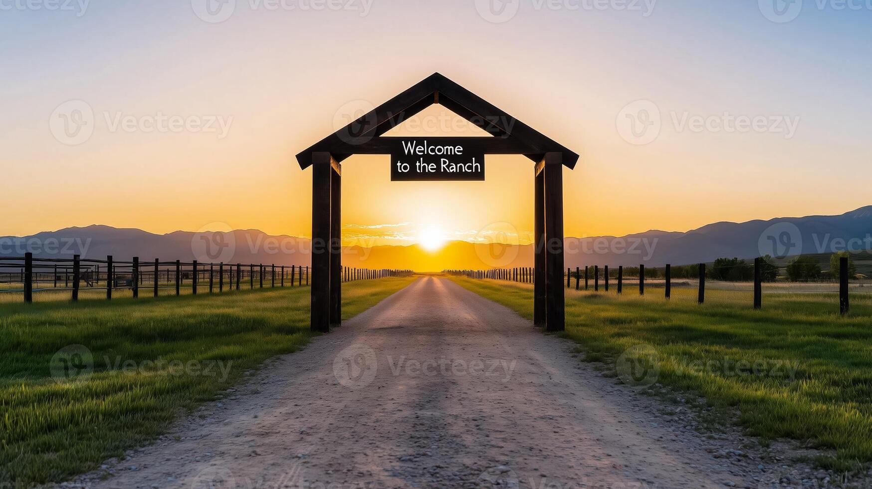 Ranch gate entrance with wooden arches and a swinging sign reading Welcome to the Ranch against a sunrise background photo