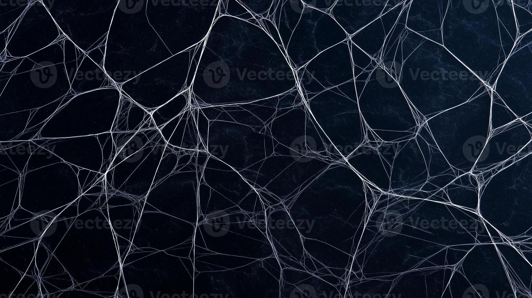 Spooky spiderweb texture on black rough fabric dark Halloween background eerie and mysterious ideal for haunting designs photo