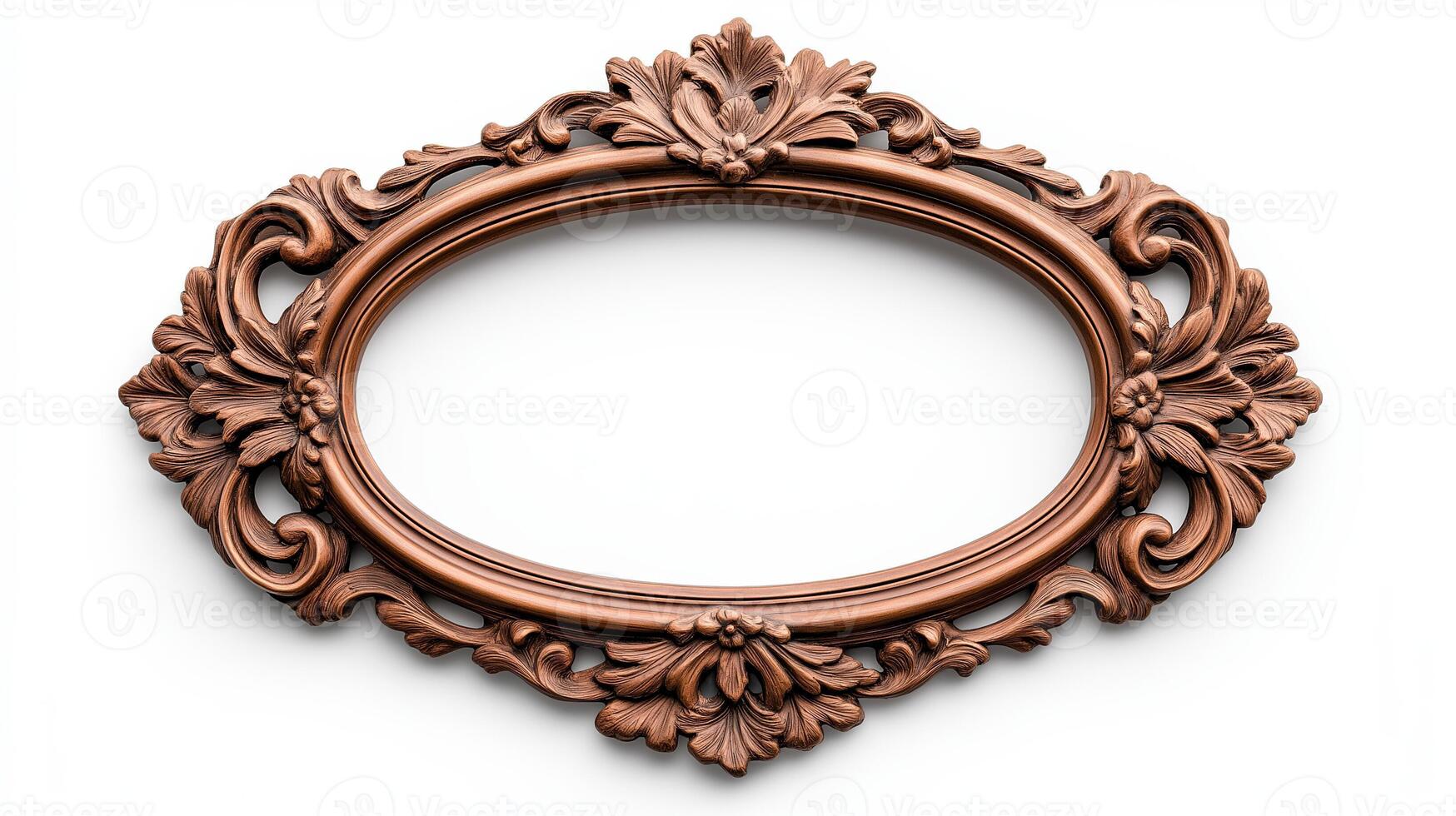 Wide angle shot of a vintage oval shaped picture frame with elaborate carvings and patina featuring baroque style scrolls and leaves isolated on a pure white background photo