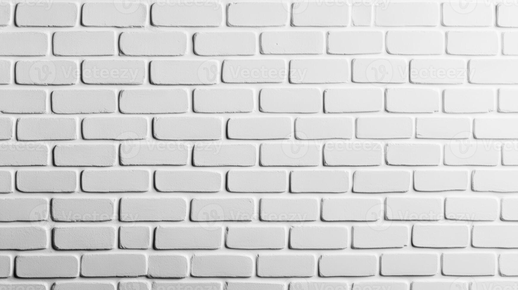 Wide shot of a painted brick wall in crisp white with textured bricks and slight surface irregularities creating a clean minimalist background with subtle depth photo