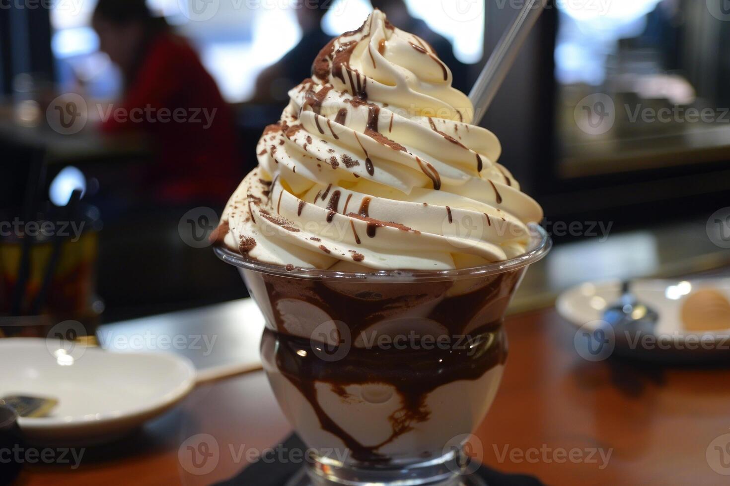 Decadent chocolate sundae with whipped cream photo