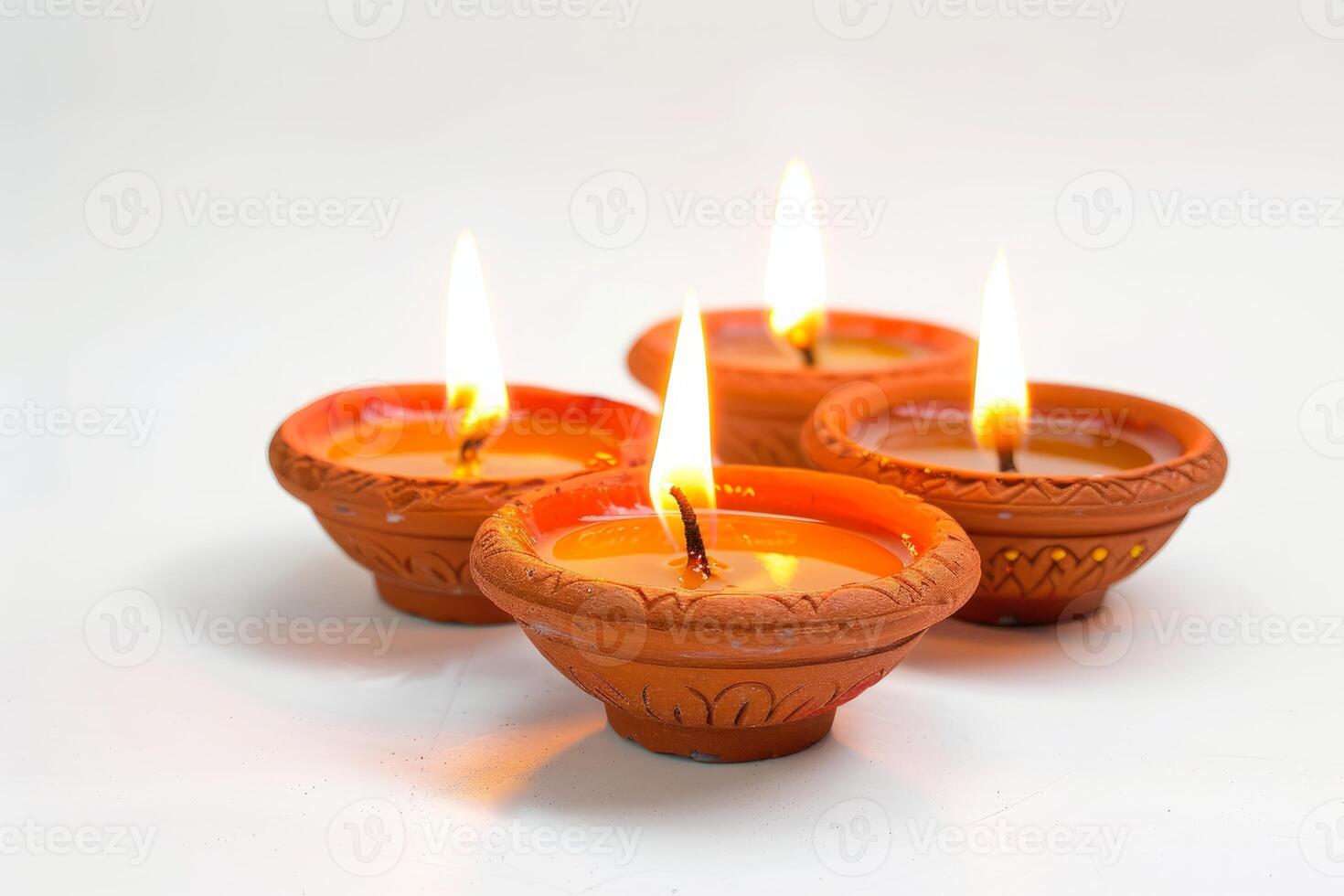 Traditional clay diya lamps lit for diwali festival photo