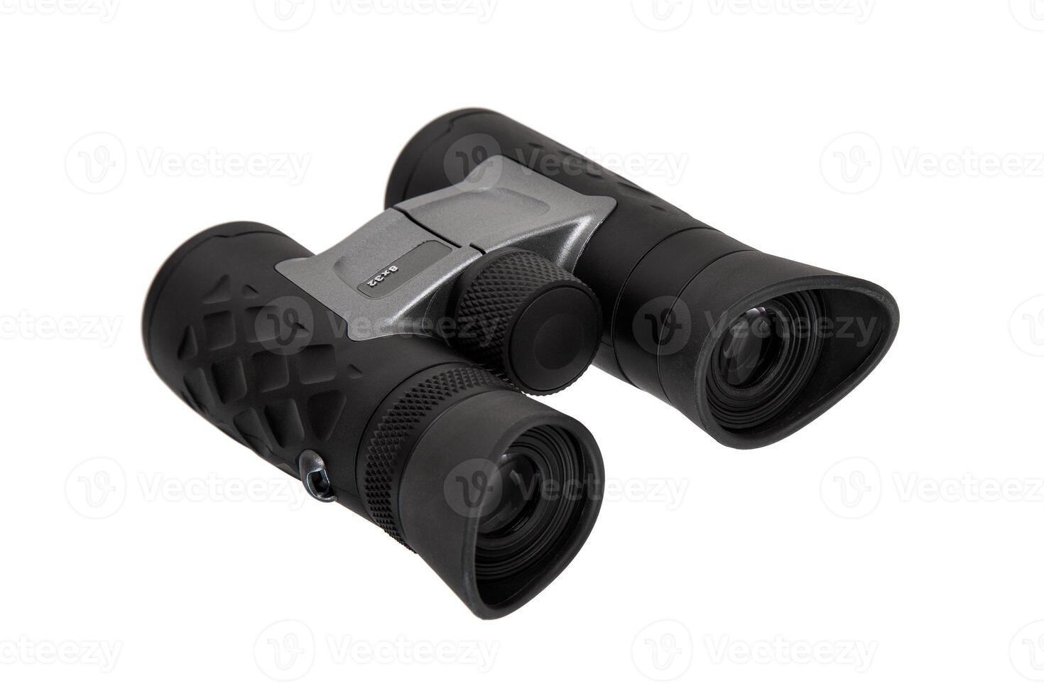 Modern binoculars. An optical instrument for observation at long distances. Isolate on a white back. photo