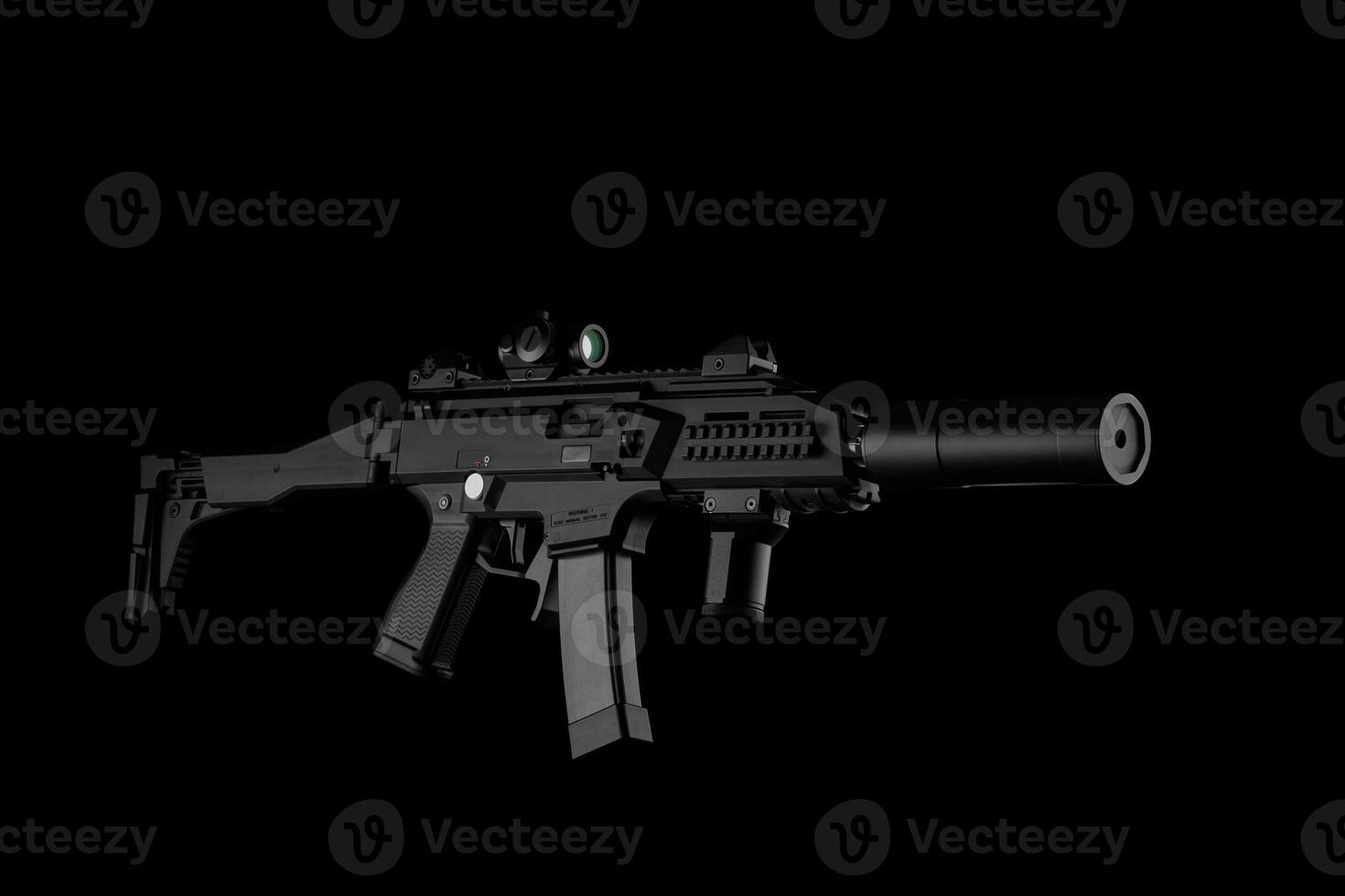 Modern automatic rifle isolated on black background. Weapons for police, special forces and the army. A carbine with optical, mechanical sights and a silencer on a dark back photo