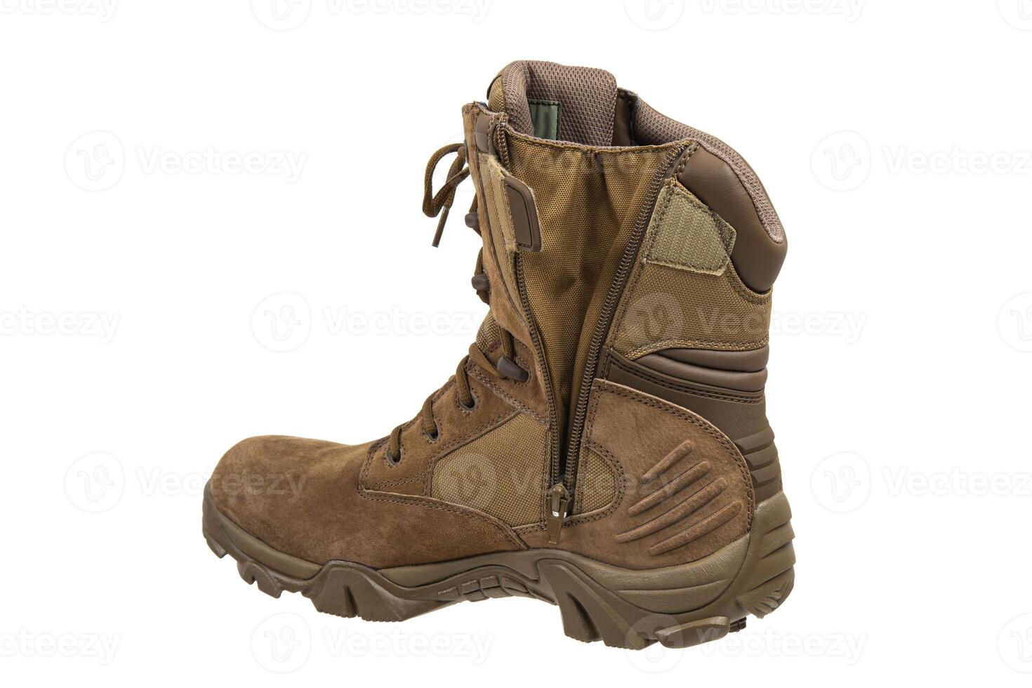 Modern army combat boots. New desert beige shoes. Isolate on a white back. photo