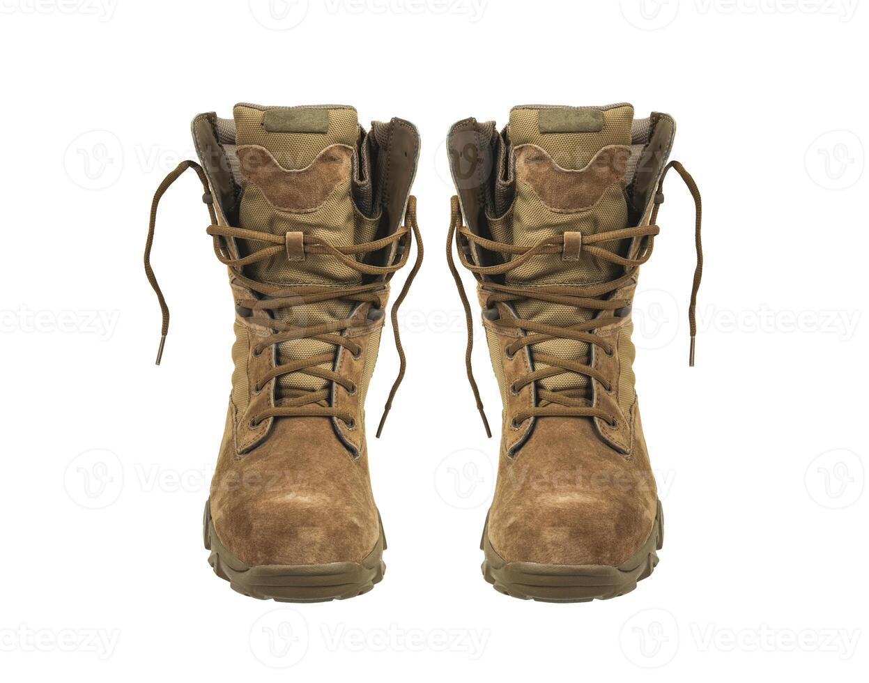 Modern army combat boots. New desert beige shoes. Isolate on a white back. photo