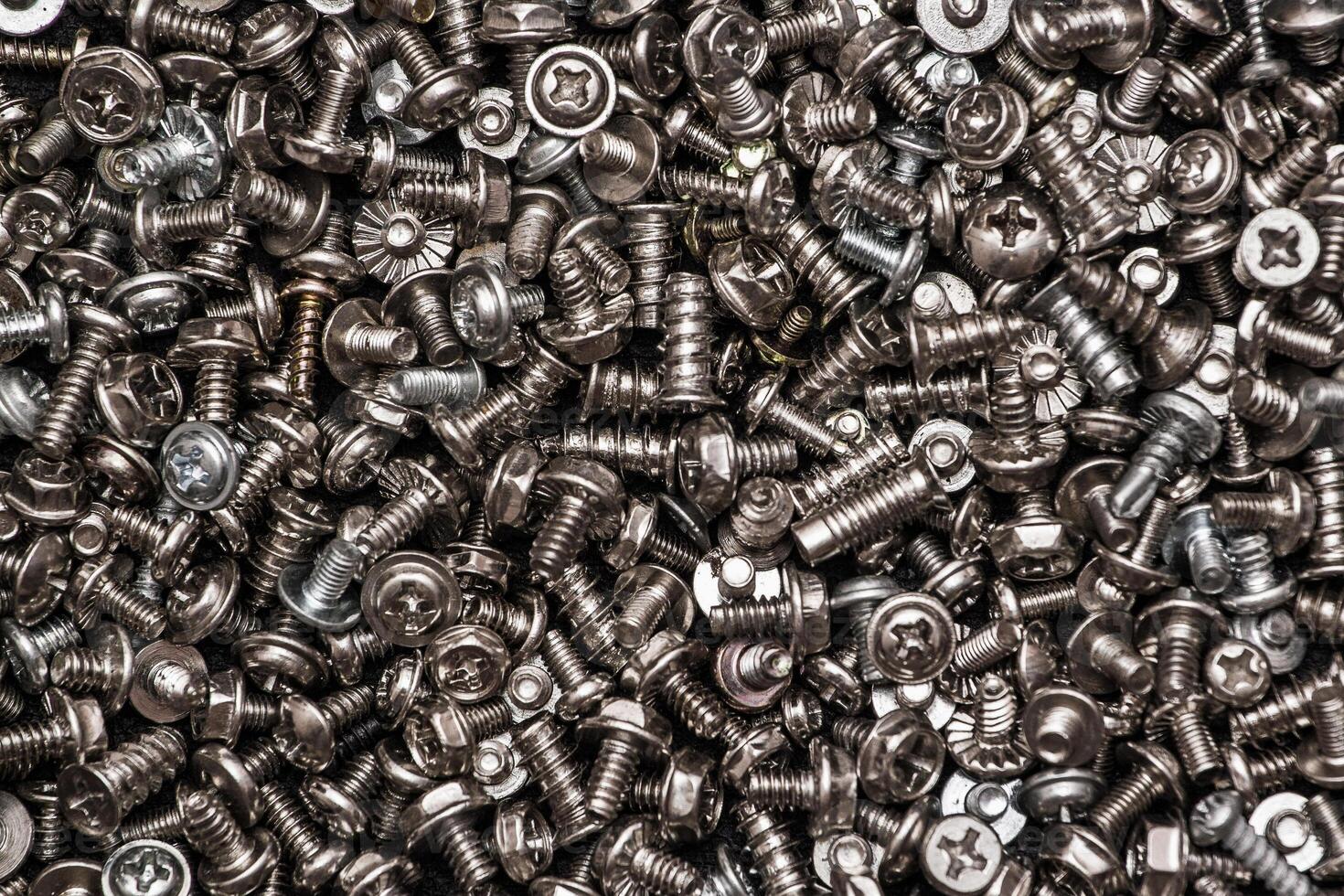 Silvery bolts and screws photo