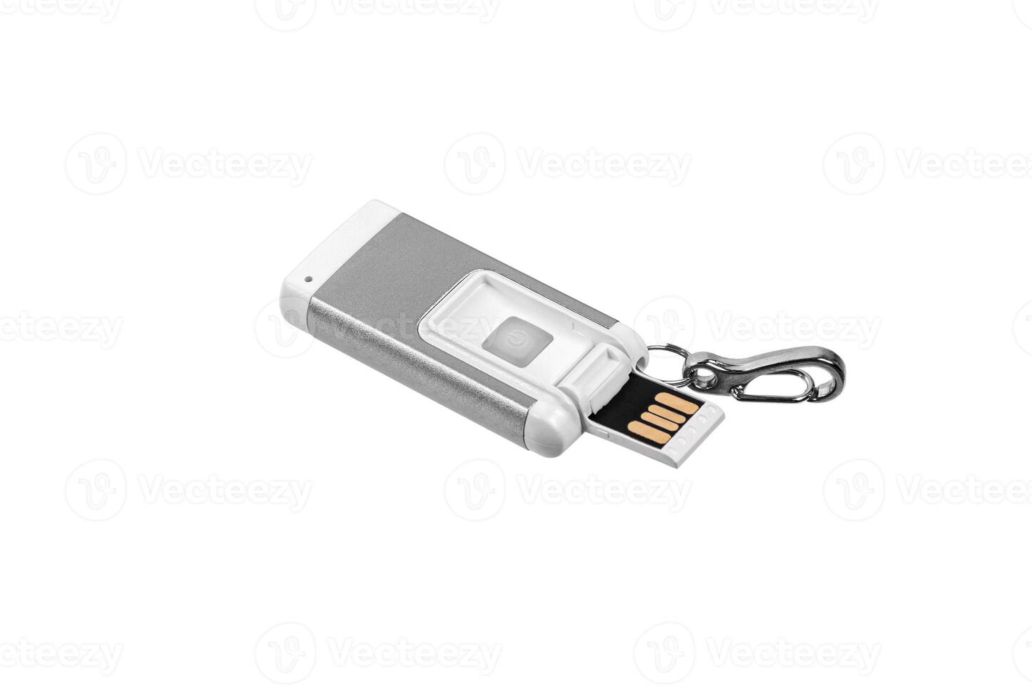USB flashlight keychain.Metal LED flashlight isolate on a white back. Pocket lamp for dark time of day or dark rooms. photo