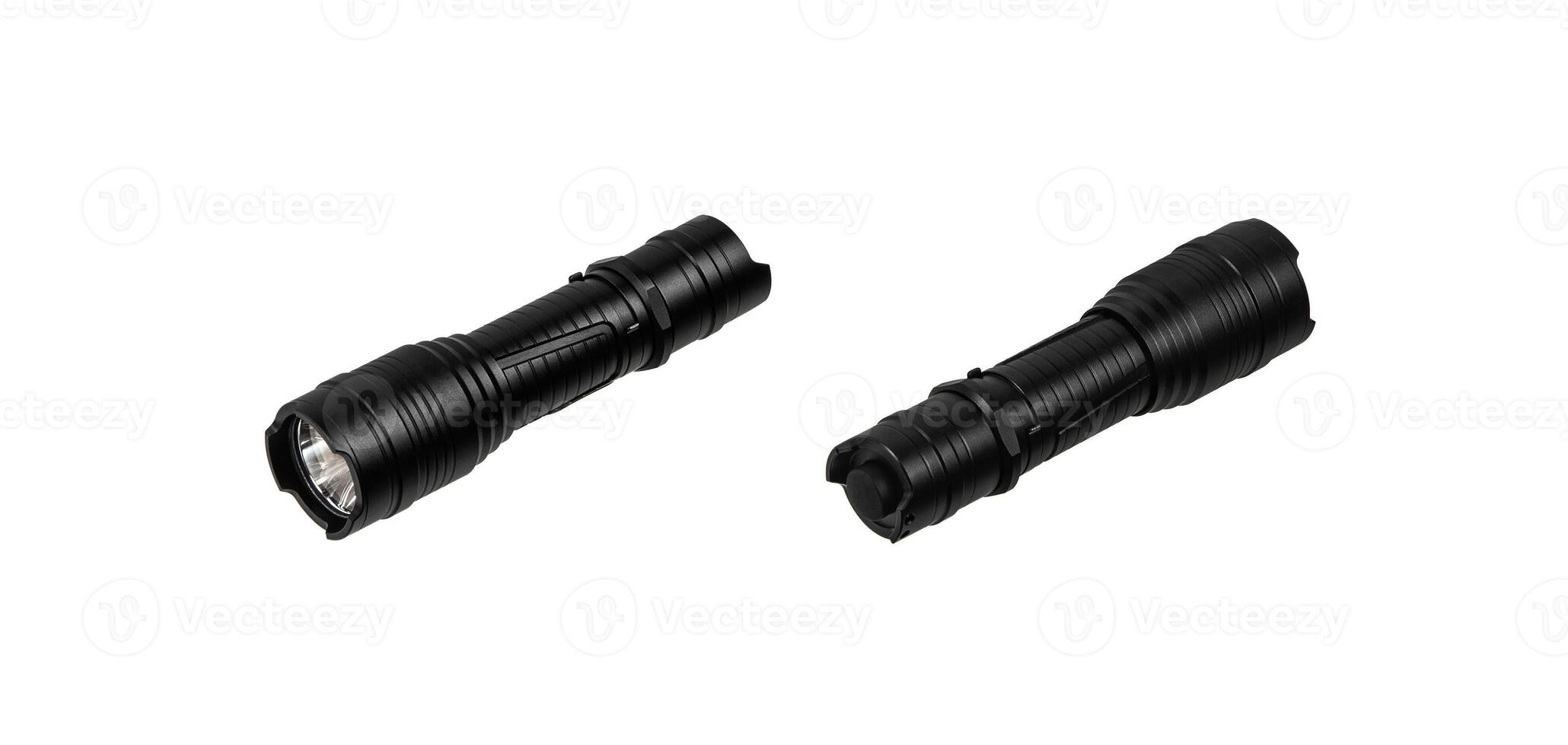 Black metal LED flashlight isolate on a white back. Pocket lamp for dark time of day or dark rooms. photo