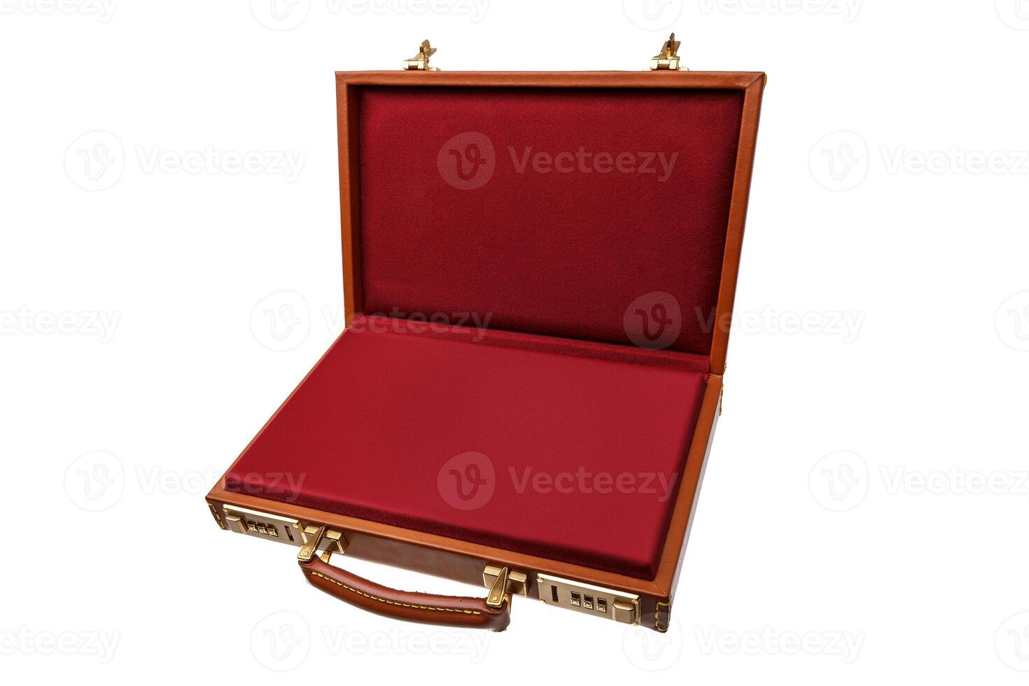 Brown leather suitcase with combination lock and gold locks isolated on white photo