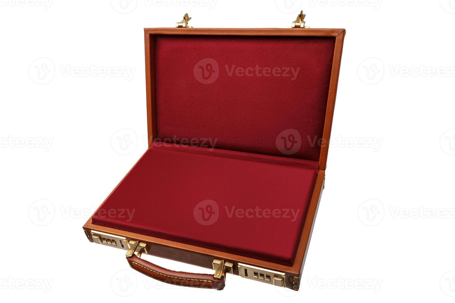 Brown leather suitcase with combination lock and gold locks isolated on white photo