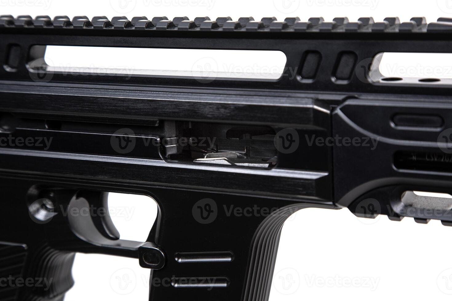 Close-up of the bolt of the carbine. A modern automatic carbine chambered for 9mm pistol caliber. Weapons for the police, army and special units. Isolate on a white back photo