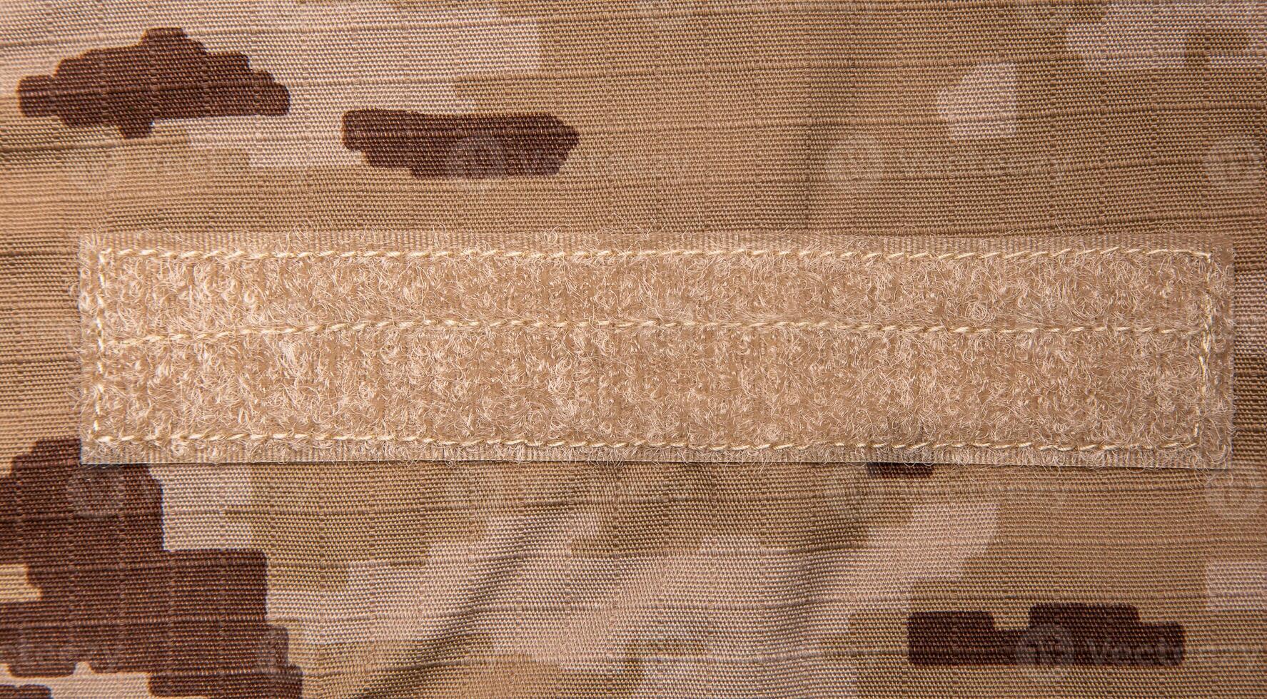 US marine desert marpat digital camouflage fabric texture back. Close-up of a fragment of a military uniform. photo