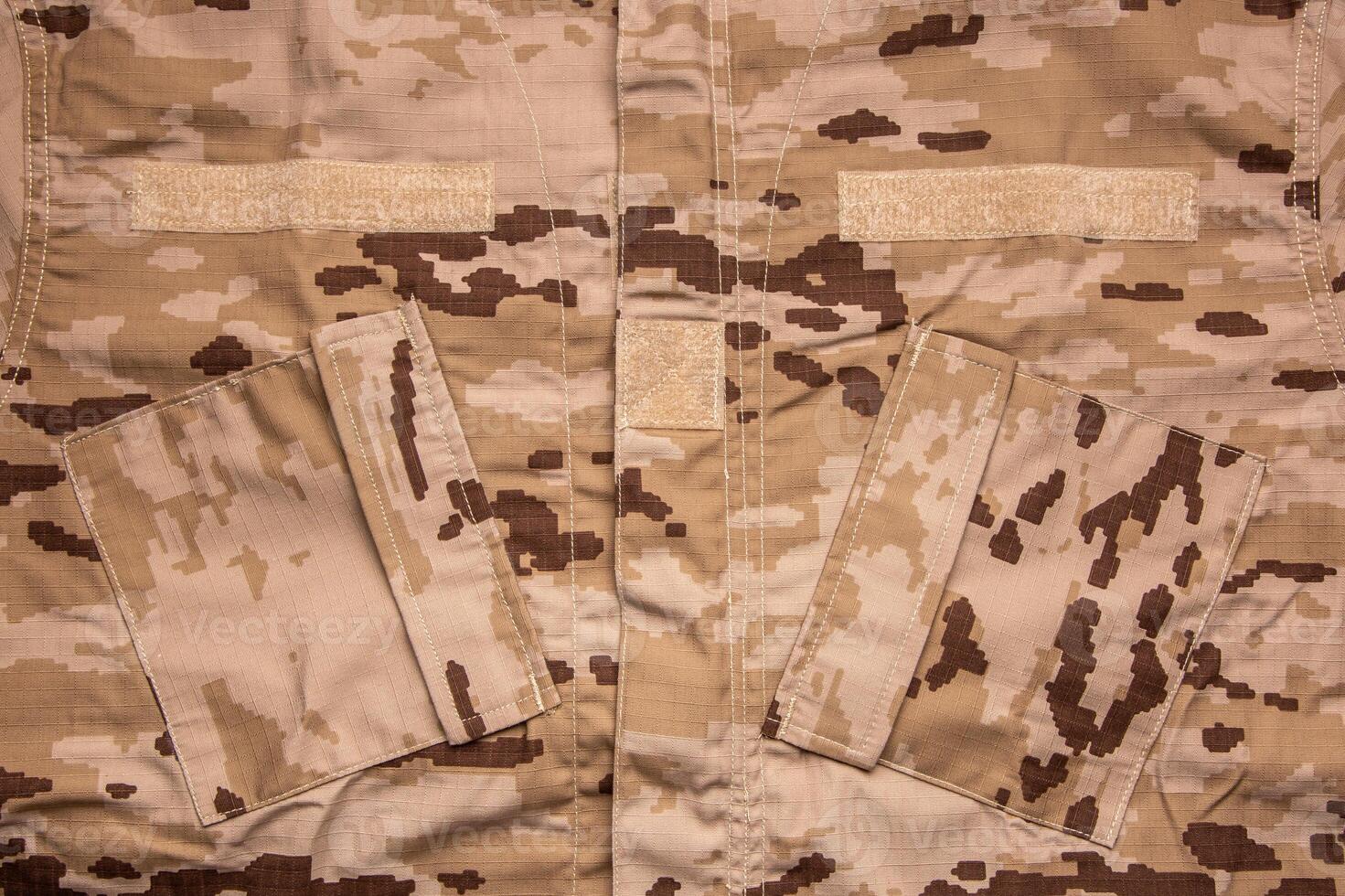 US marine desert marpat digital camouflage fabric texture back. Close-up of a fragment of a military uniform. photo
