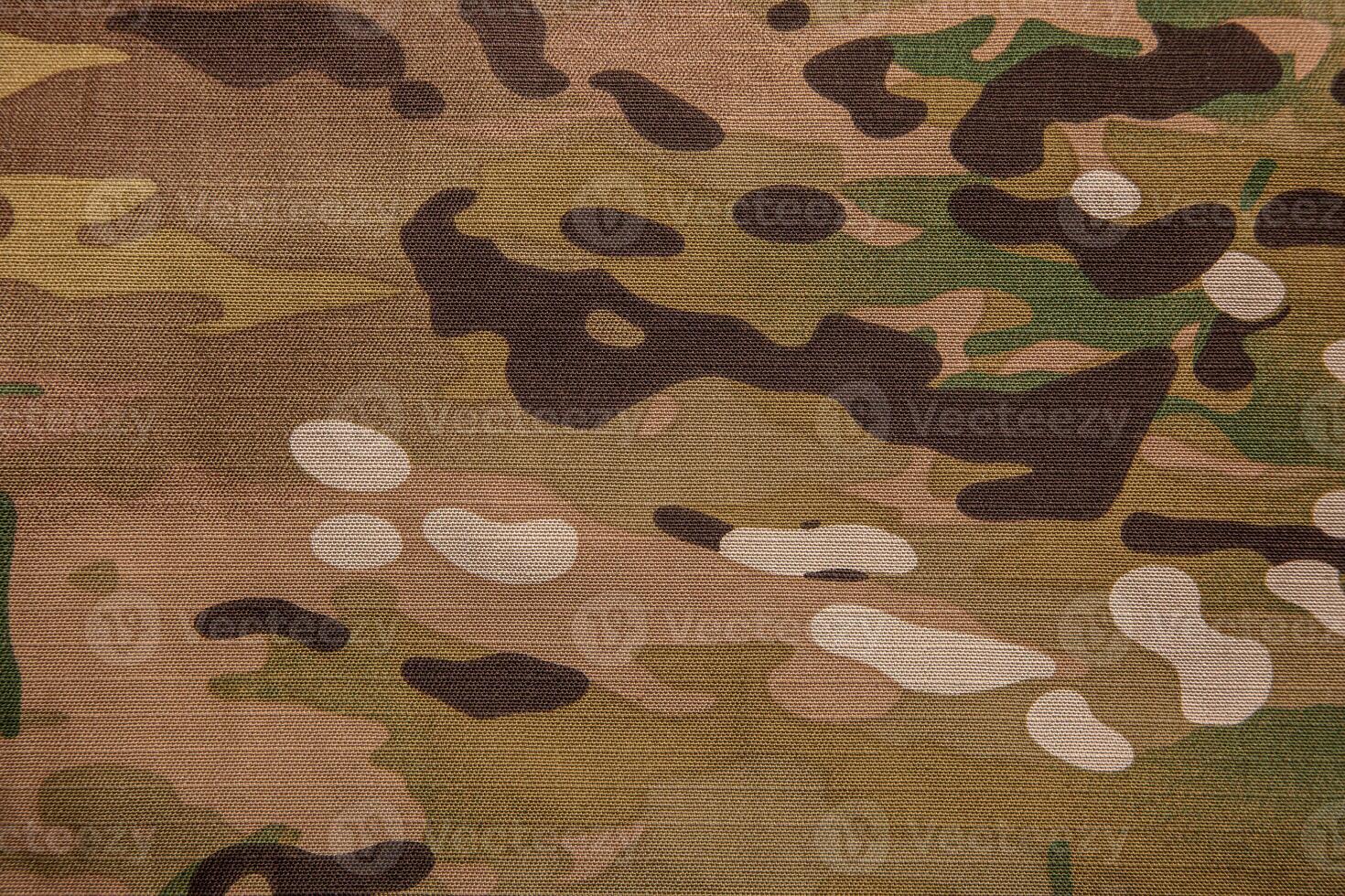 Armed force multicam camouflage fabric texture back. photo