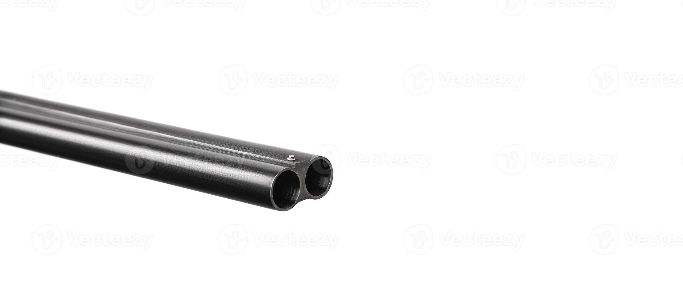 A close-up of the trunks of a classic double-barreled hunting shotgun. Weapons for hunting and sport isolate on a white background. photo