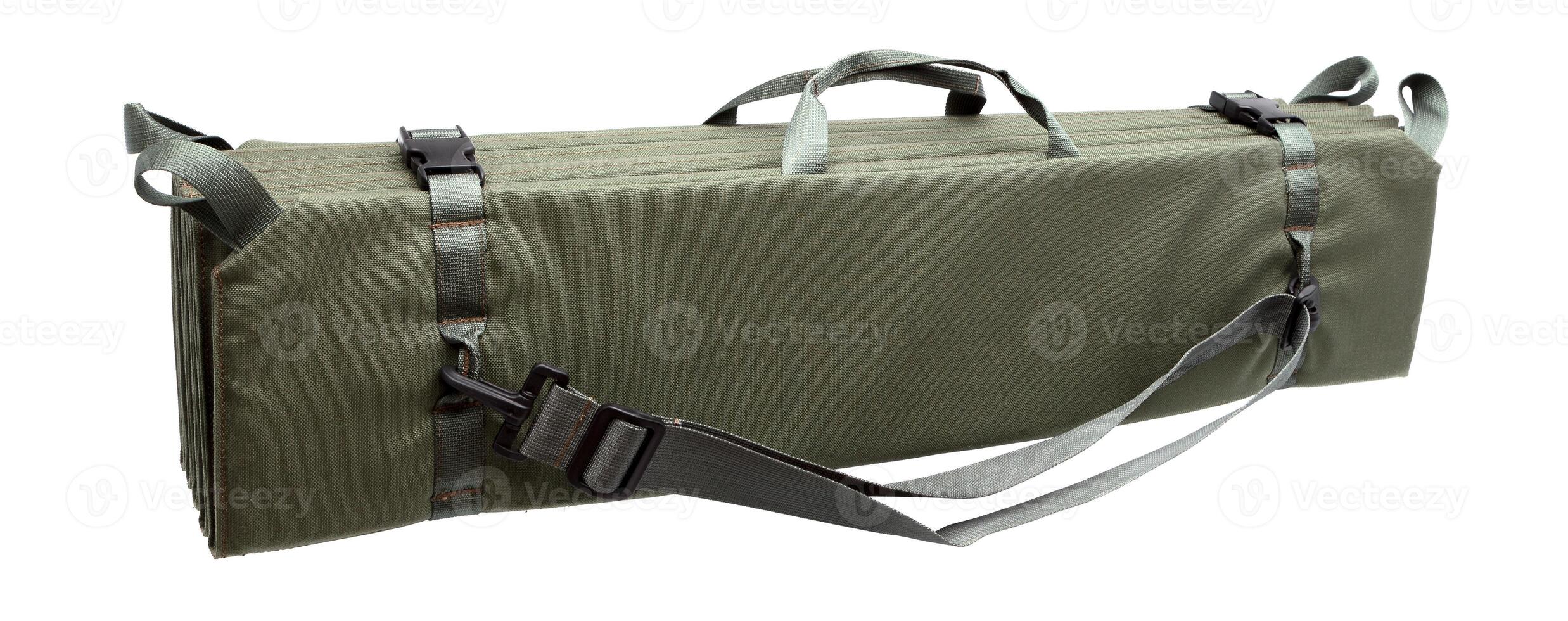Folding portable military mat khaki for snipers. Isolate on a white back. photo