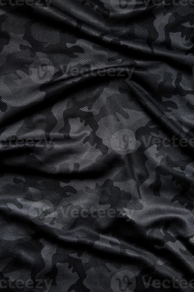 Camouflage pattern. Trendy dark gray camouflage fabric. Military texture. Dark back. photo