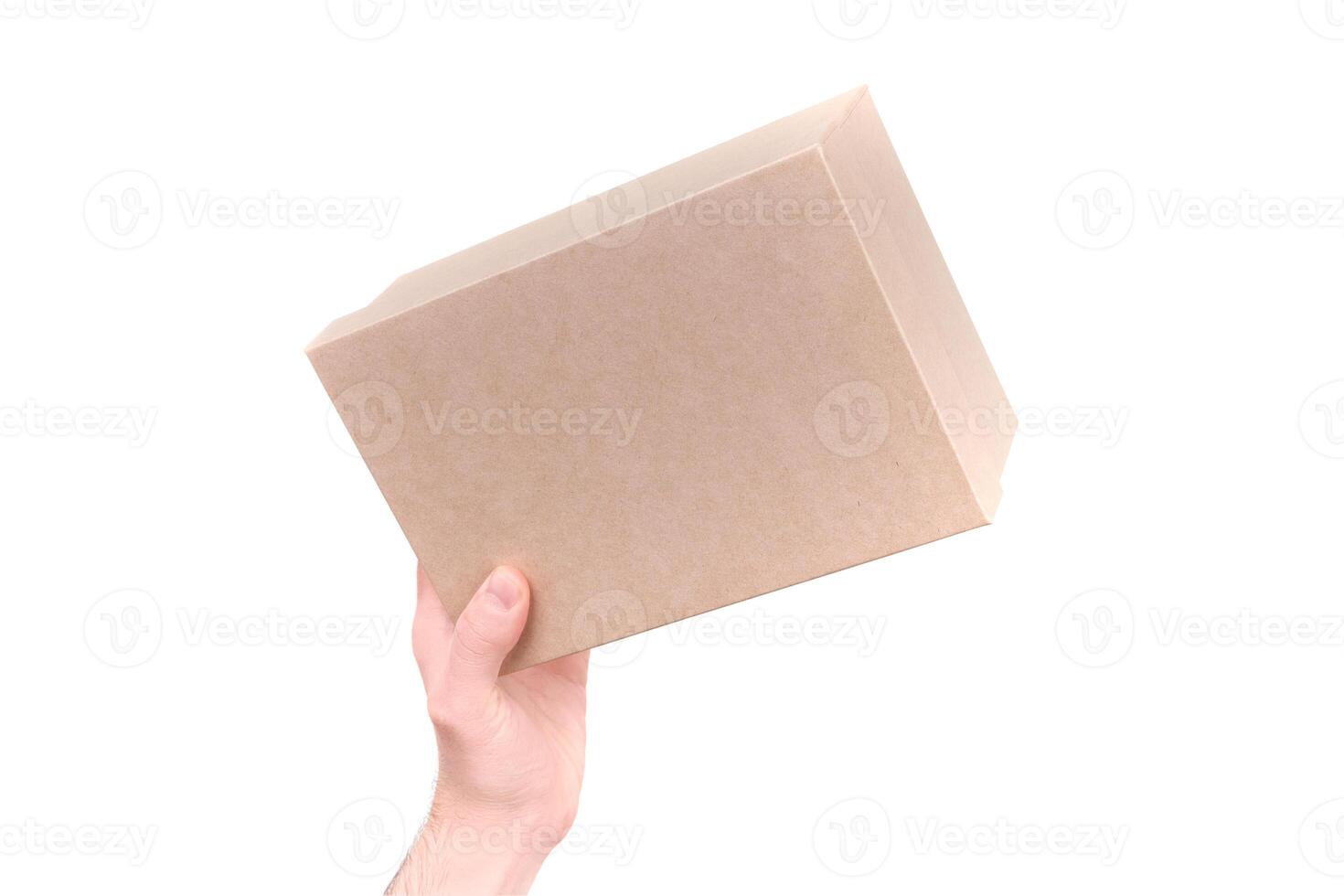 men's hands hold a gift box. isolate on white photo