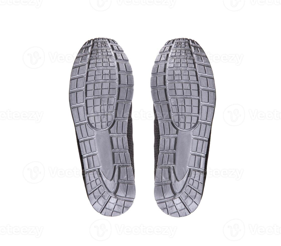 Gray soles of modern sneakers. Sports shoes isolate on a white background. photo