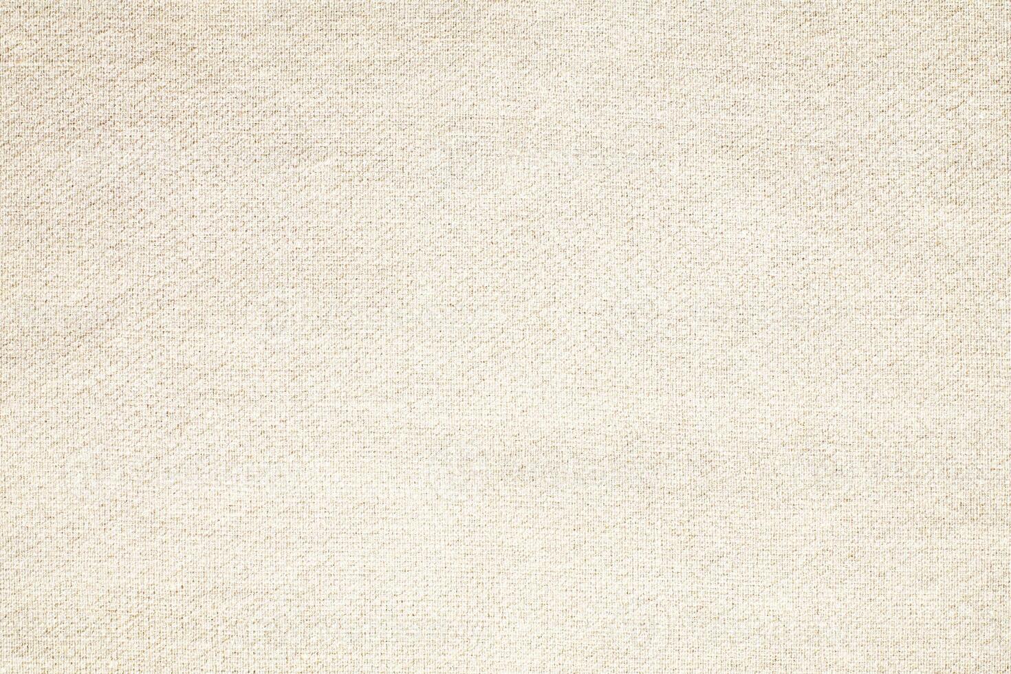 Natural Linen Material Textile Canvas Fabric Texture Background Close-up Detail of Fabric Natural Color Hemp Material Pattern Design Wallpaper. Can be Used as Background or For Graphic Design photo