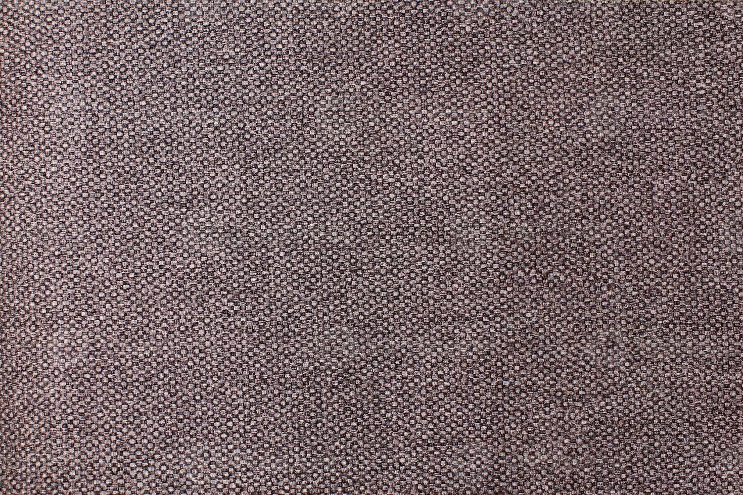 Natural Linen Material Textile Canvas Fabric Texture Background Close-up Detail of Fabric Natural Color Hemp Material Pattern Design Wallpaper. Can be Used as Background or For Graphic Design photo