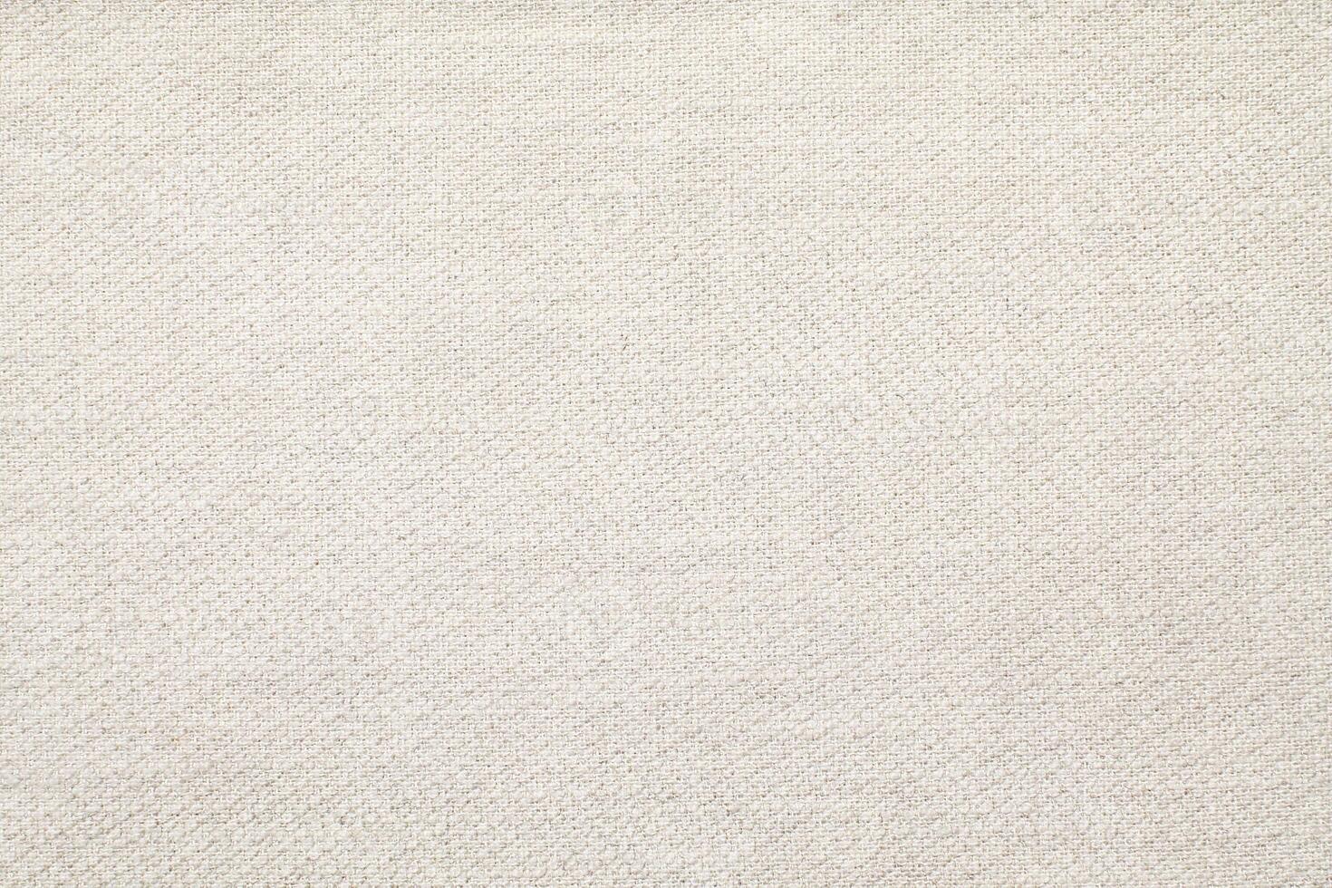 Natural Linen Material Textile Canvas Fabric Texture Background Close-up Detail of Fabric Natural Color Hemp Material Pattern Design Wallpaper. Can be Used as Background or For Graphic Design photo