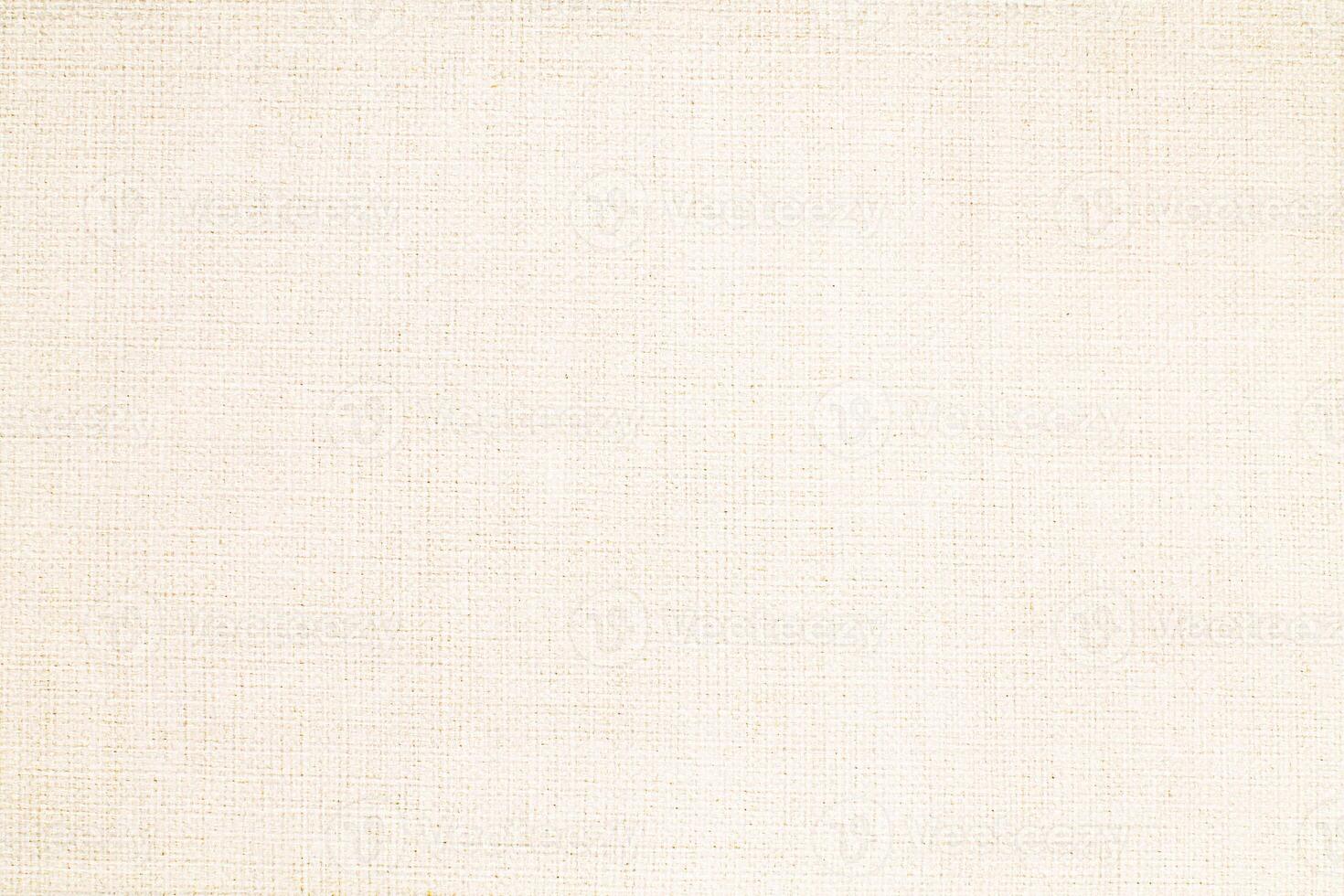 Natural Linen Material Textile Canvas Fabric Texture Background Close-up Detail of Fabric Natural Color Hemp Material Pattern Design Wallpaper. Can be Used as Background or For Graphic Design photo