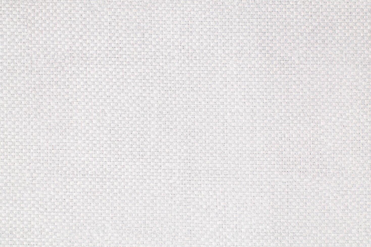 Natural Linen Material Textile Canvas Fabric Texture Background Close-up Detail of Fabric Natural Color Hemp Material Pattern Design Wallpaper. Can be Used as Background or For Graphic Design photo