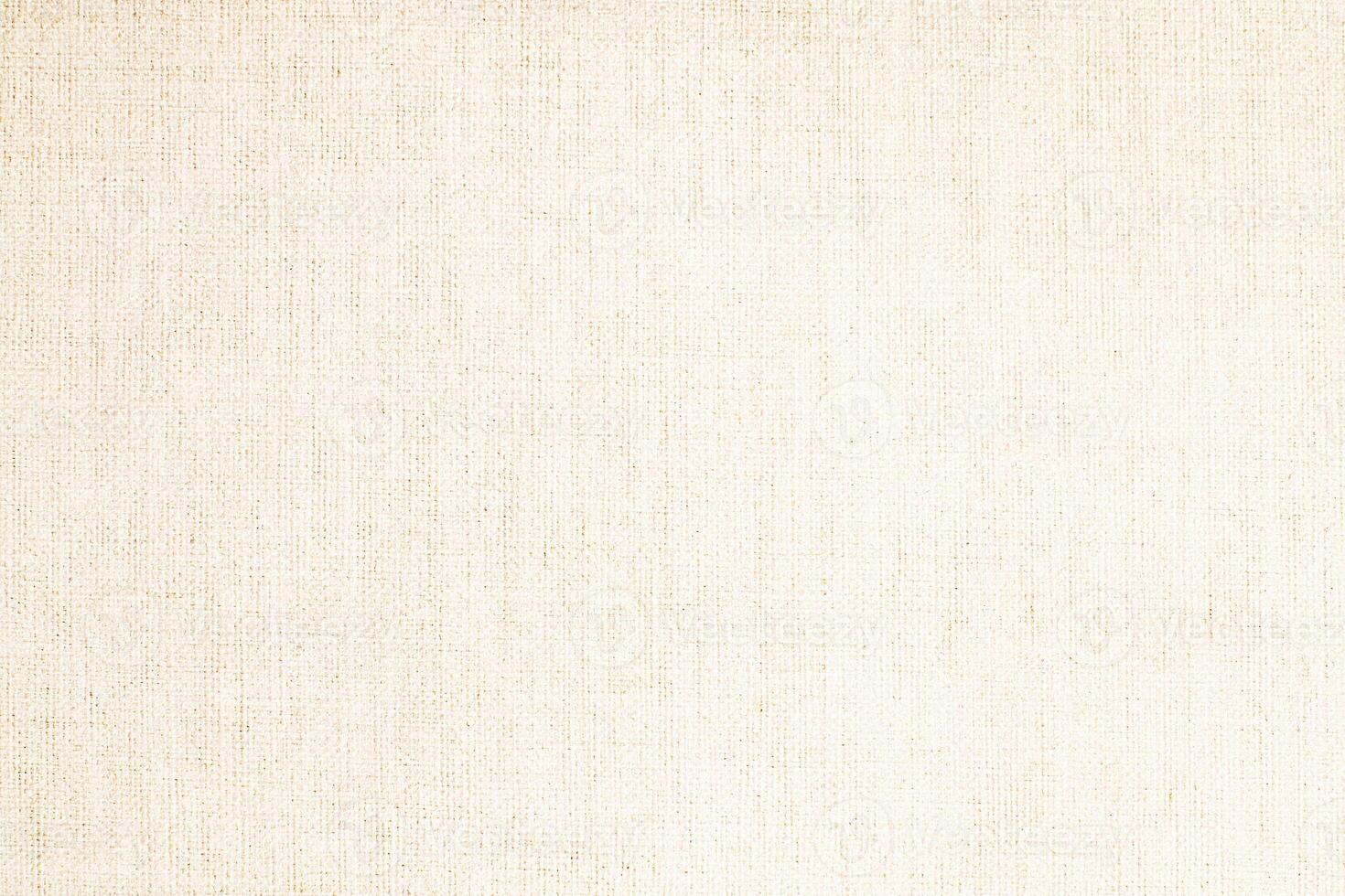 Natural Linen Material Textile Canvas Fabric Texture Background Close-up Detail of Fabric Natural Color Hemp Material Pattern Design Wallpaper. Can be Used as Background or For Graphic Design photo
