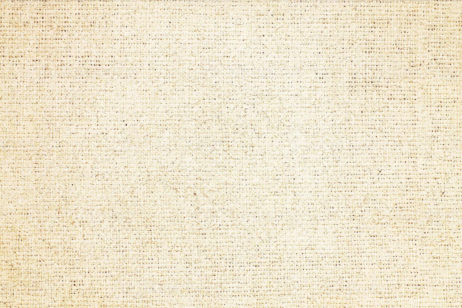 Natural Linen Material Textile Canvas Fabric Texture Background Close-up Detail of Fabric Natural Color Hemp Material Pattern Design Wallpaper. Can be Used as Background or For Graphic Design photo