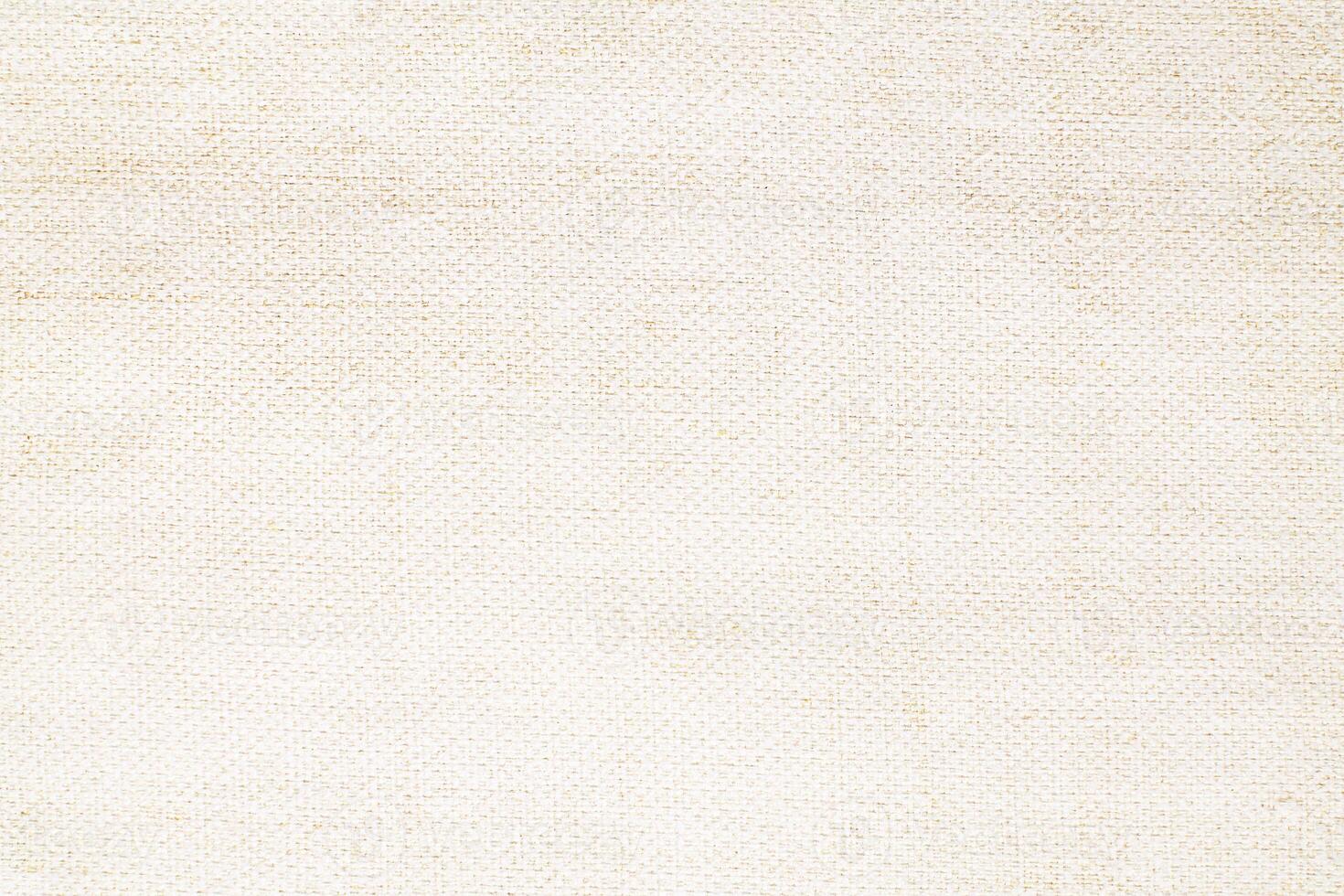 Natural Linen Material Textile Canvas Fabric Texture Background Close-up Detail of Fabric Natural Color Hemp Material Pattern Design Wallpaper. Can be Used as Background or For Graphic Design photo