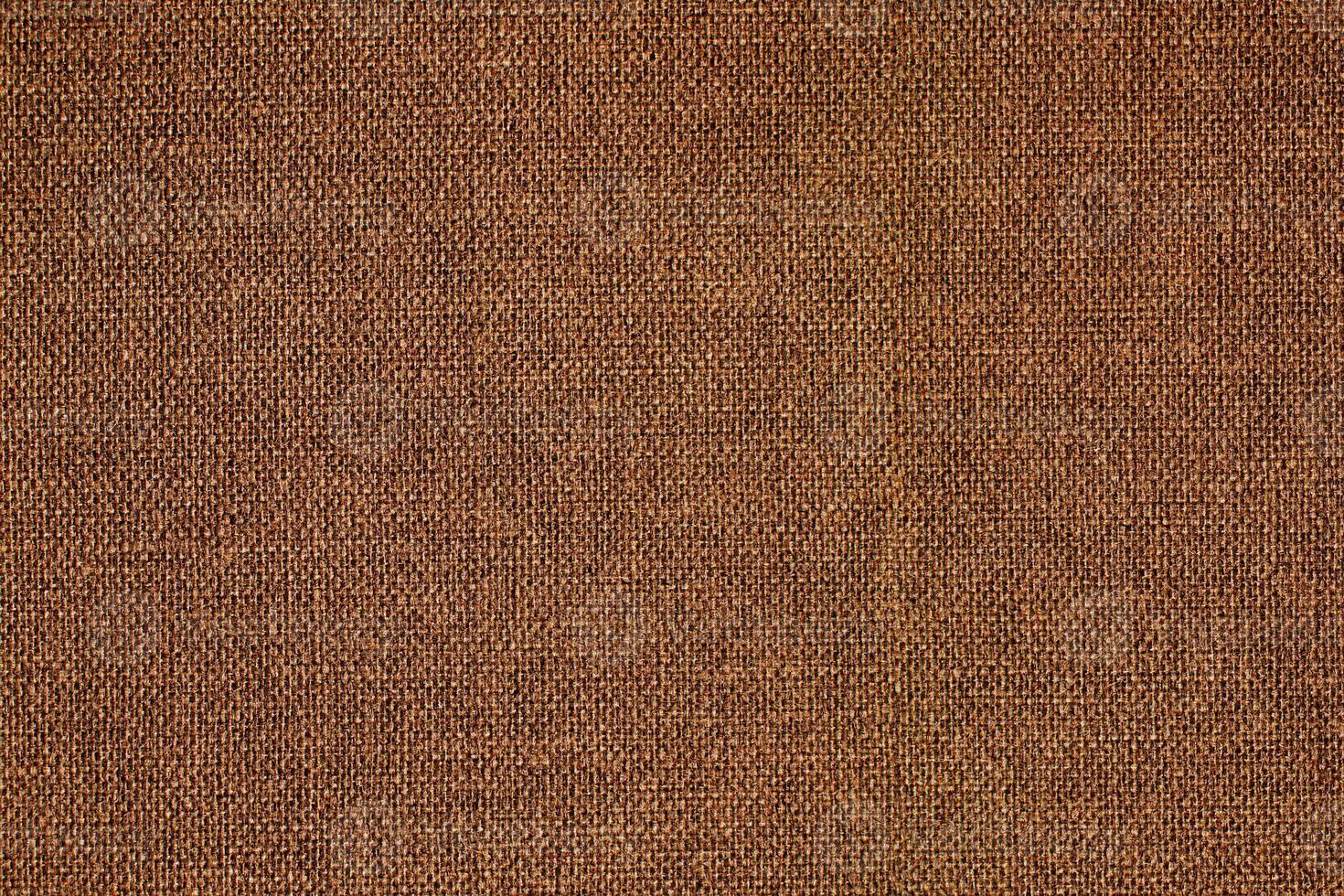 Natural Linen Material Textile Canvas Fabric Texture Background Close-up Detail of Fabric Natural Color Hemp Material Pattern Design Wallpaper. Can be Used as Background or For Graphic Design photo