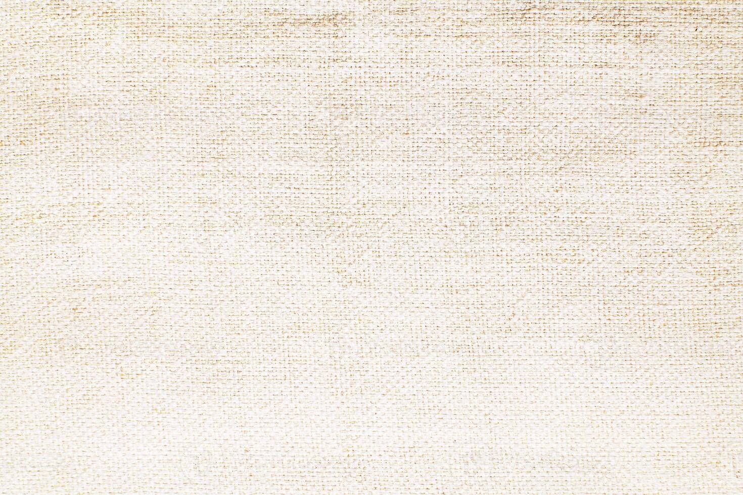 Natural Linen Material Textile Canvas Fabric Texture Background Close-up Detail of Fabric Natural Color Hemp Material Pattern Design Wallpaper. Can be Used as Background or For Graphic Design photo