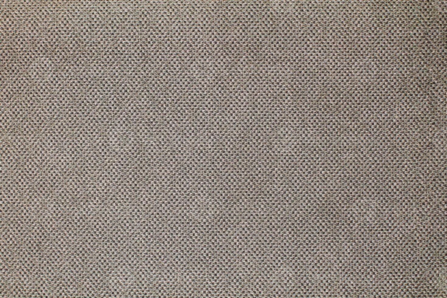 Natural Linen Material Textile Canvas Fabric Texture Background Close-up Detail of Fabric Natural Color Hemp Material Pattern Design Wallpaper. Can be Used as Background or For Graphic Design photo