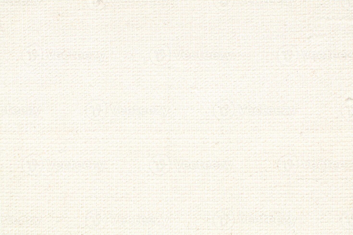 Natural Linen Material Textile Canvas Fabric Texture Background Close-up Detail of Fabric Natural Color Hemp Material Pattern Design Wallpaper. Can be Used as Background or For Graphic Design photo