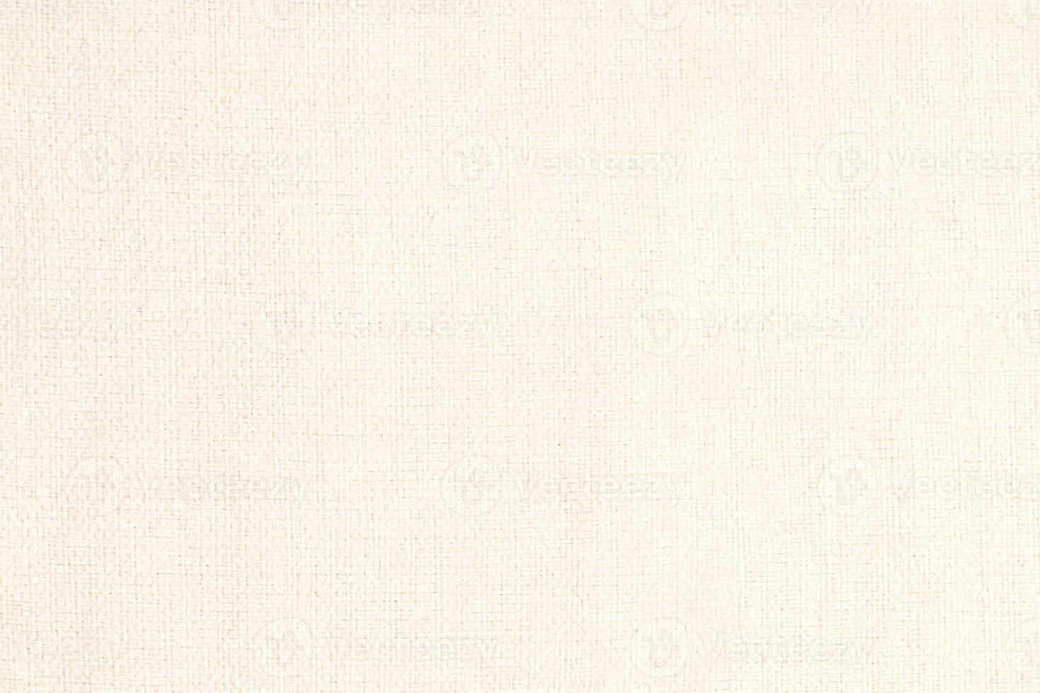 Natural Linen Material Textile Canvas Fabric Texture Background Close-up Detail of Fabric Natural Color Hemp Material Pattern Design Wallpaper. Can be Used as Background or For Graphic Design photo