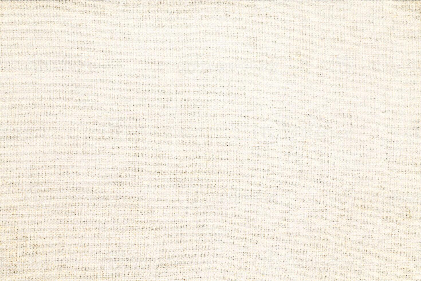Natural Linen Material Textile Canvas Fabric Texture Background Close-up Detail of Fabric Natural Color Hemp Material Pattern Design Wallpaper. Can be Used as Background or For Graphic Design photo
