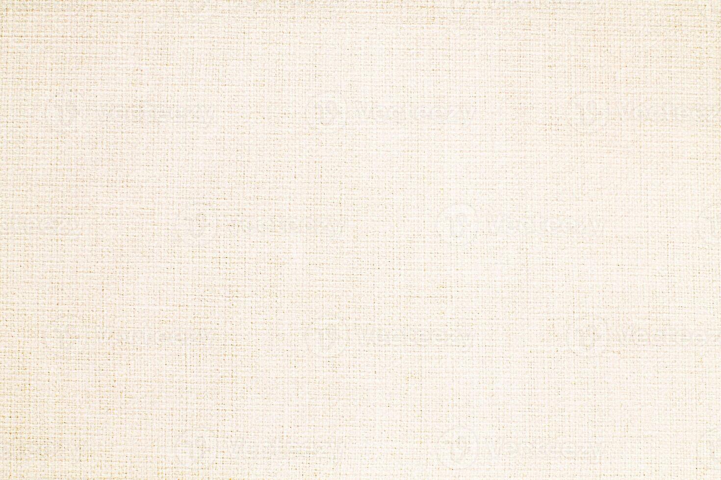 Natural Linen Material Textile Canvas Fabric Texture Background Close-up Detail of Fabric Natural Color Hemp Material Pattern Design Wallpaper. Can be Used as Background or For Graphic Design photo
