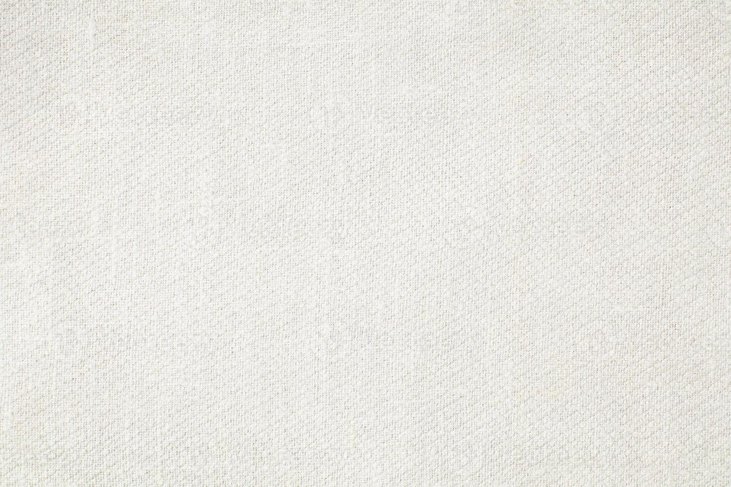 Natural Linen Material Textile Canvas Fabric Texture Background Close-up Detail of Fabric Natural Color Hemp Material Pattern Design Wallpaper. Can be Used as Background or For Graphic Design photo