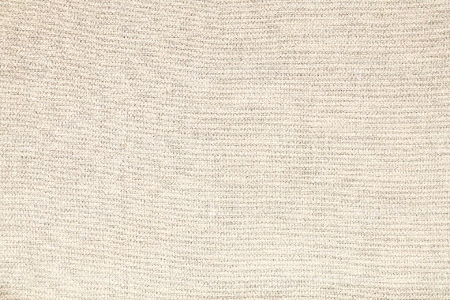 Natural Linen Material Textile Canvas Fabric Texture Background Close-up Detail of Fabric Natural Color Hemp Material Pattern Design Wallpaper. Can be Used as Background or For Graphic Design photo