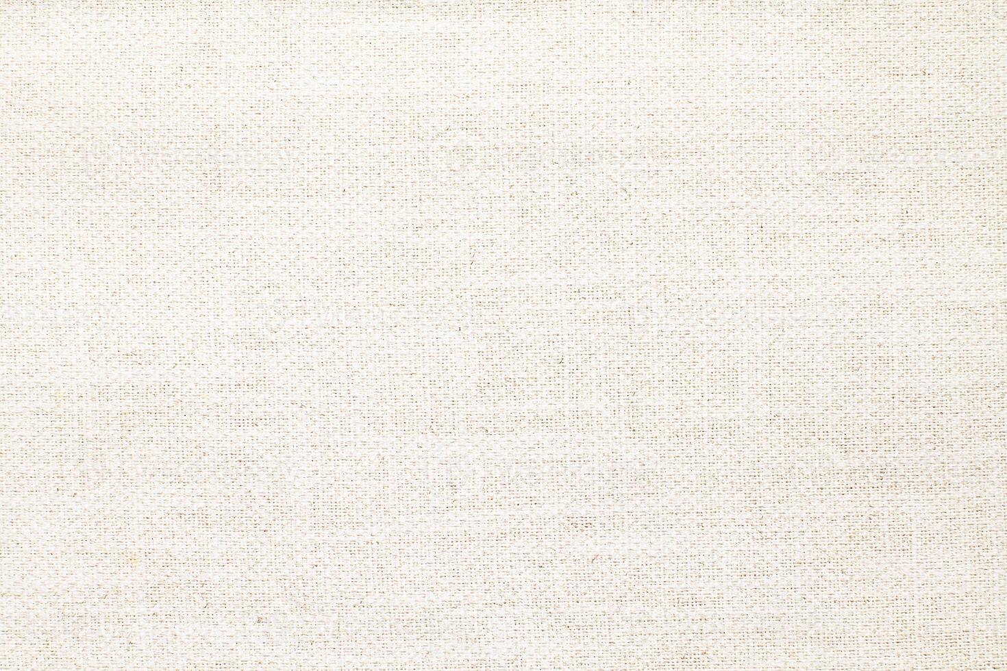 Natural Linen Material Textile Canvas Fabric Texture Background Close-up Detail of Fabric Natural Color Hemp Material Pattern Design Wallpaper. Can be Used as Background or For Graphic Design photo