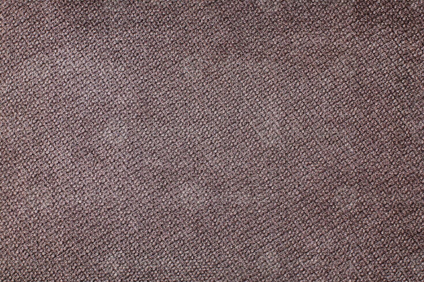 Natural Linen Material Textile Canvas Fabric Texture Background Close-up Detail of Fabric Natural Color Hemp Material Pattern Design Wallpaper. Can be Used as Background or For Graphic Design photo