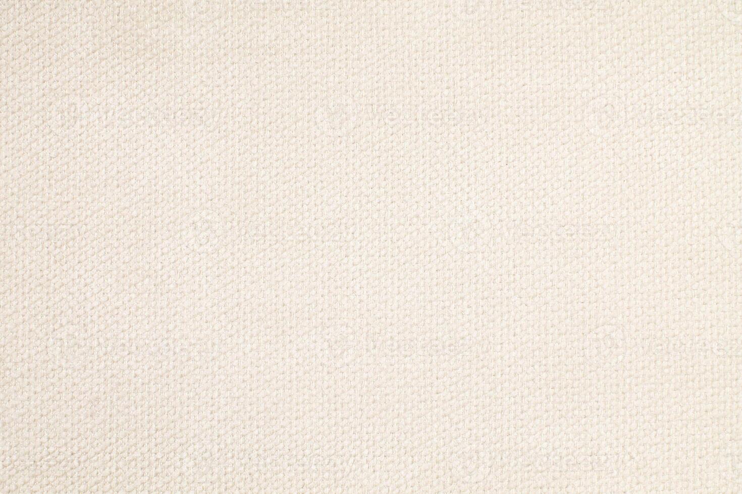 Natural Linen Material Textile Canvas Fabric Texture Background Close-up Detail of Fabric Natural Color Hemp Material Pattern Design Wallpaper. Can be Used as Background or For Graphic Design photo