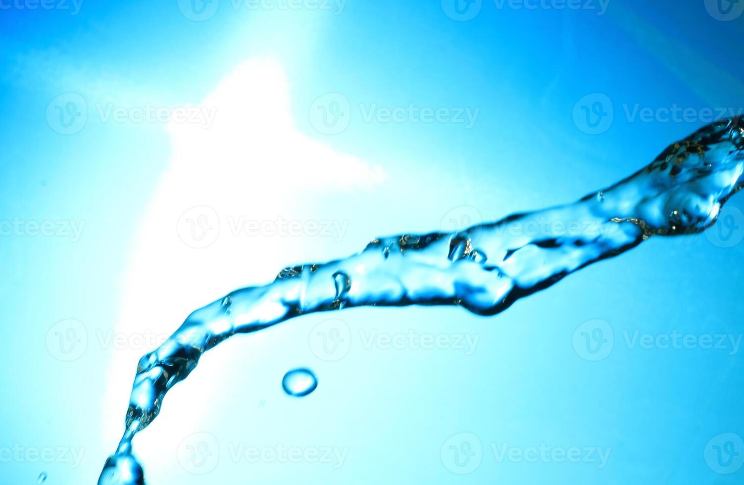 Fresh Water With Underwater Bubbles Texture on a Blue Background Close-up Abstract Liquid Bubbles Aqua Design Wallpaper photo