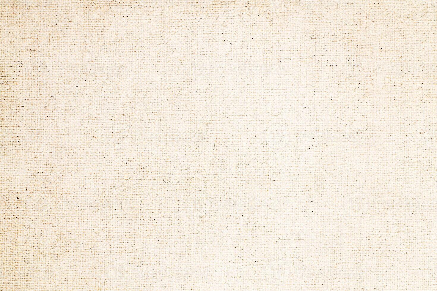Natural Linen Material Textile Canvas Fabric Texture Background Close-up Detail of Fabric Natural Color Hemp Material Pattern Design Wallpaper. Can be Used as Background or For Graphic Design photo